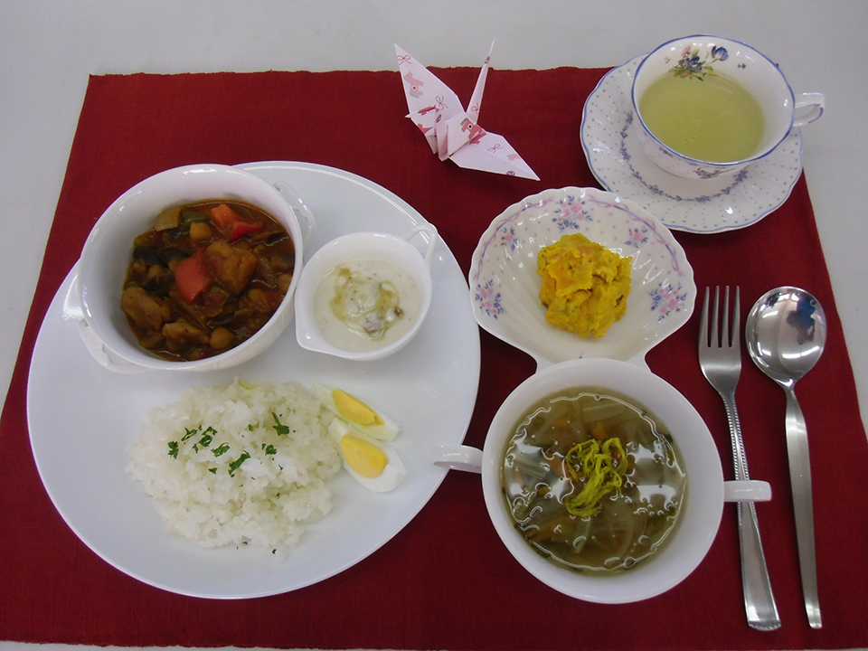 vegetable-packed biryani-style curry and a consommé julienne with onions grown