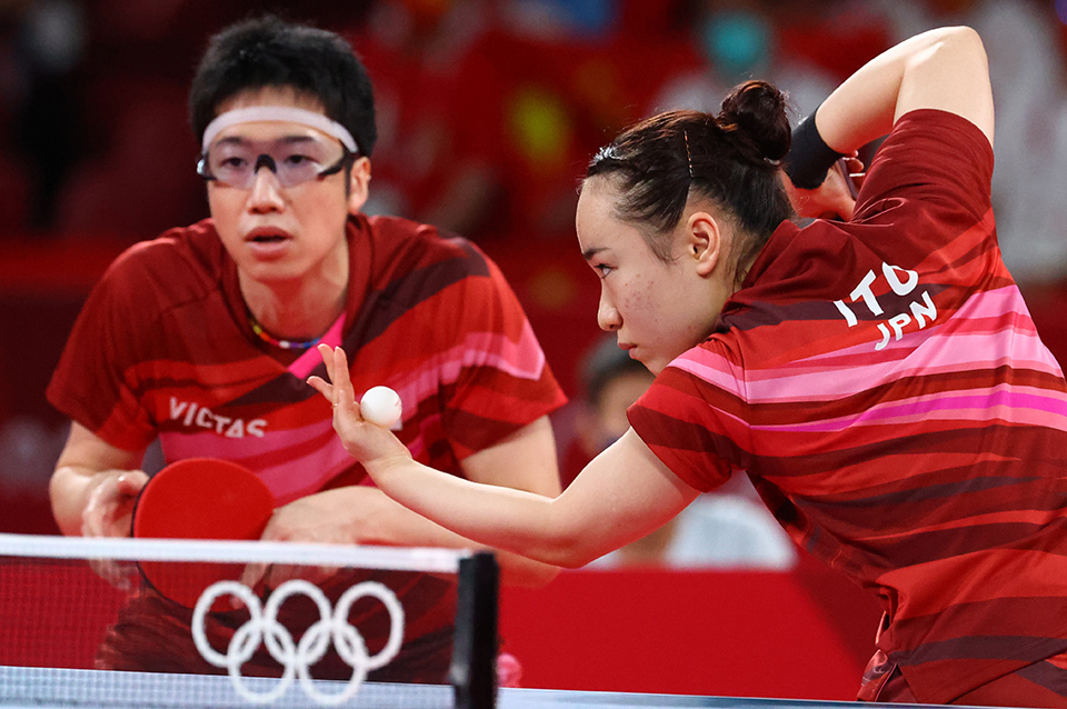 The Japanese duo of MIZUTANI Jun and ITO Mima won the gold in a new event, mixed doubles table tennis. REUTERS/AFLO