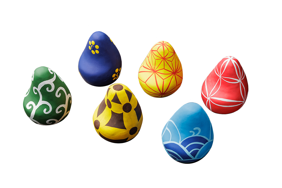 Okiagari koboshi which are “wish balls” painted with traditional Japanese patterns.