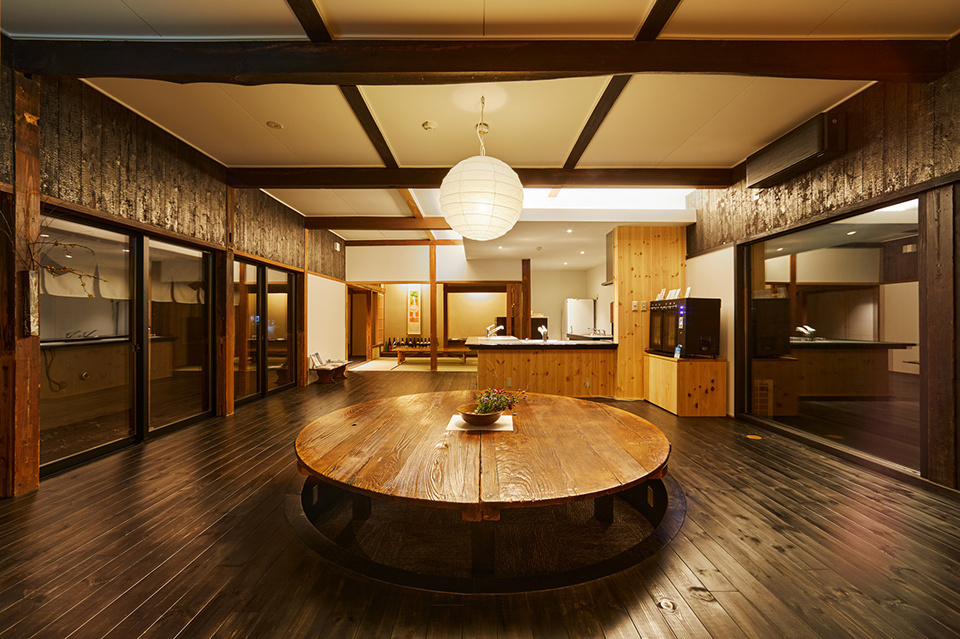 Woody interior of the sake brewery hotel, KURABITO STAY