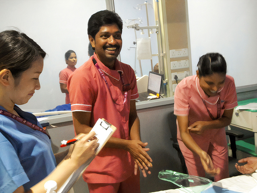 Nurses at Sakra World Hospital participating in a training with a Japanese supervisor.