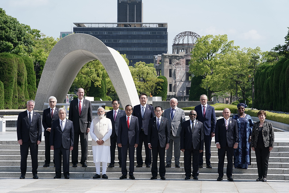The leaders of the invited countries, the heads of international organizations and Prime Minister Kishida with A-Bomb Dome and Memorial Monument in the Background
