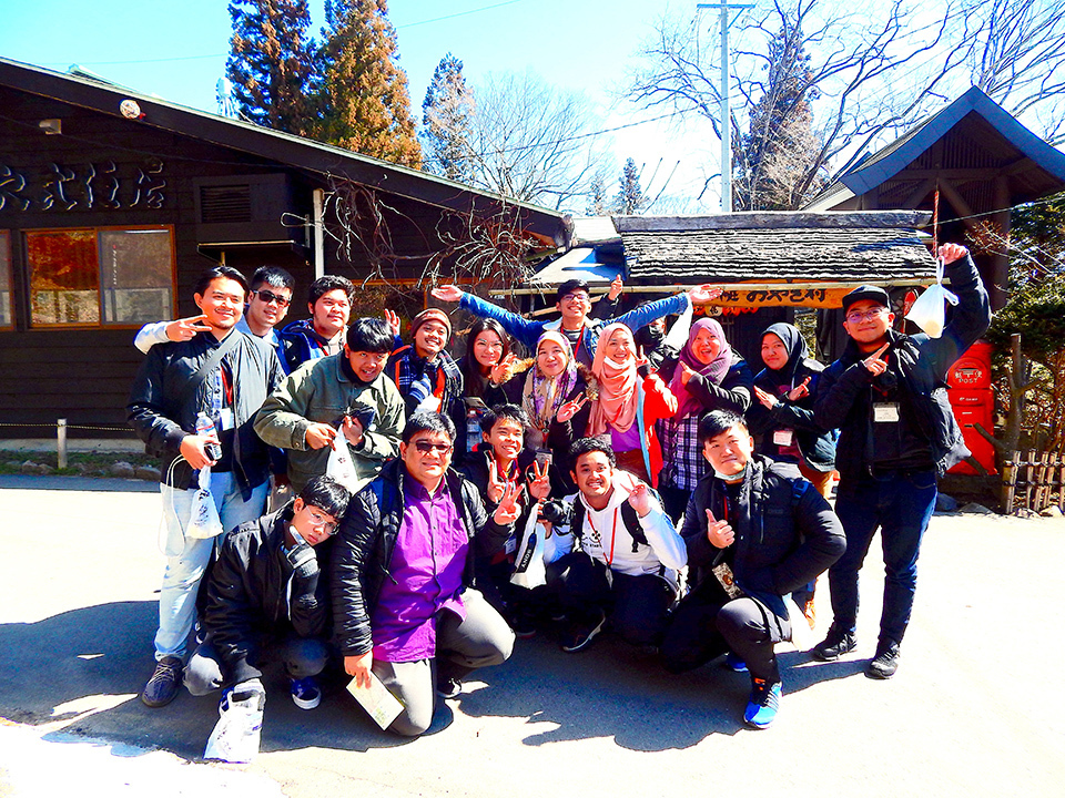 Students from Brunei posing after they tried Japanese local food in Hakuba, Nagano Prefecture.