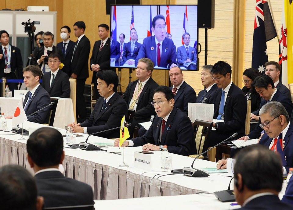 A group of individuals seated around a long rectangular table, with Prime Minister Kishida Fumio in attendance.
