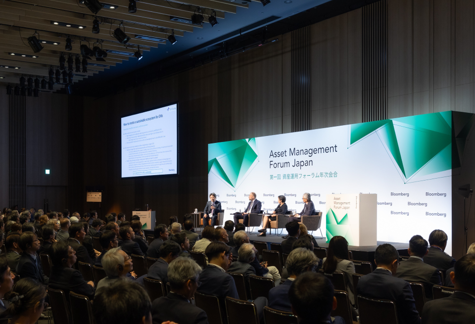 Photo of four speakers from the 2024 Japan Asset Management Forum annual meeting