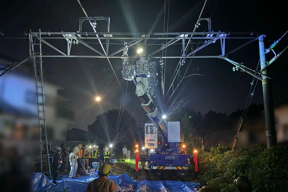 A Multiple Handling Vehicle being used to maintain railway infrastructure