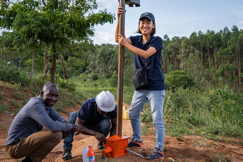TSUBOI Aya, CEO of Sunda Technology Global Co., Ltd at a water pump in Uganda