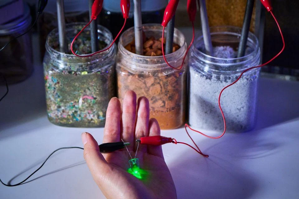 An experiment showing how micropower can be collected from marine plastic, bricks and sea glass
