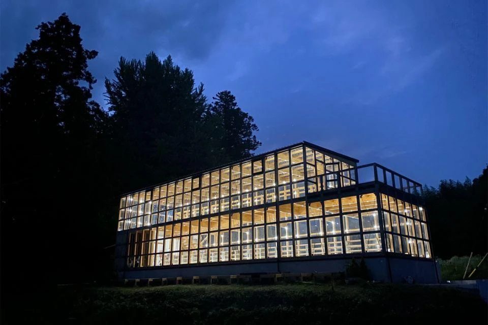 A night view of Lu-An, a micropower experimentation laboratory, lit up after dark