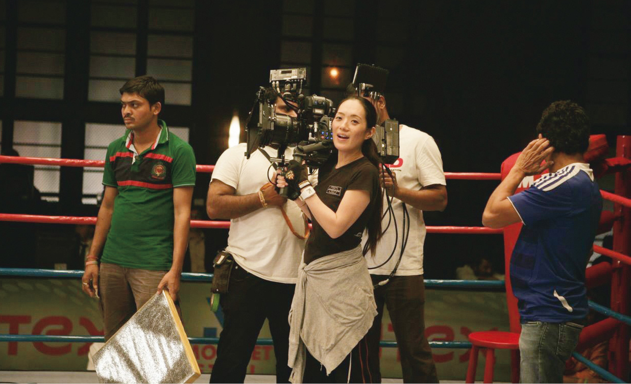 As her style of freely walking among the actors carrying a heavy camera is rare in India, it surprised the rest of the film crew.