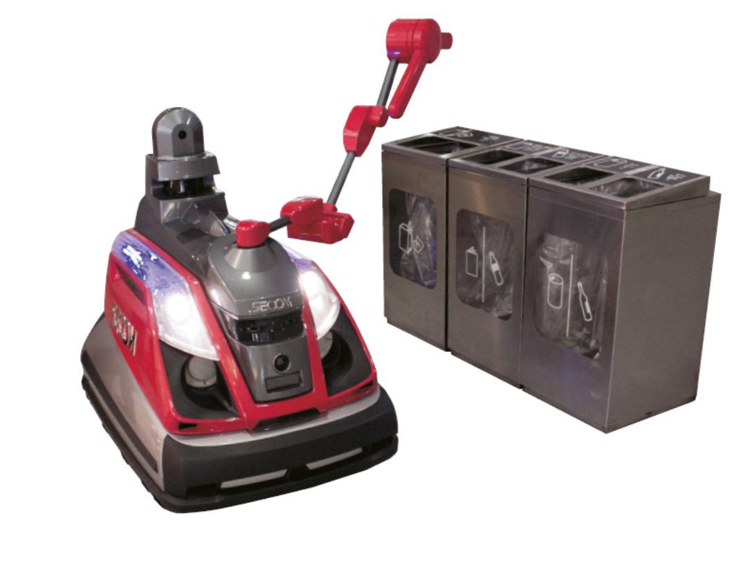 Four security robots are operating at Narita International Airport. The robots maneuver by themselves among airport users while giving the warning “patrolling.”