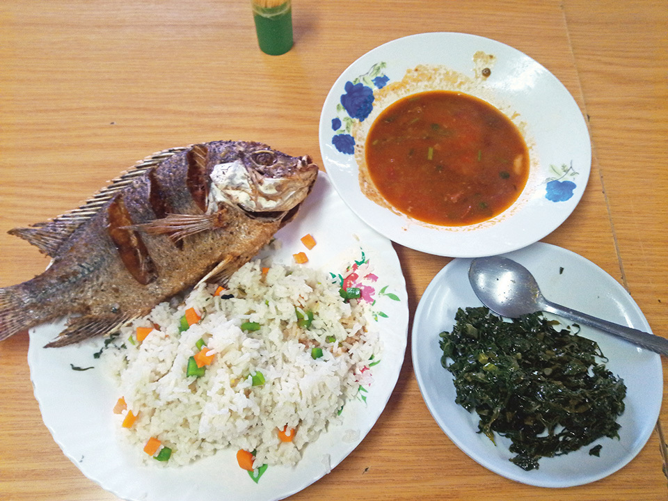 It is now common to eat rice together with meat and vegetables in Kenya.